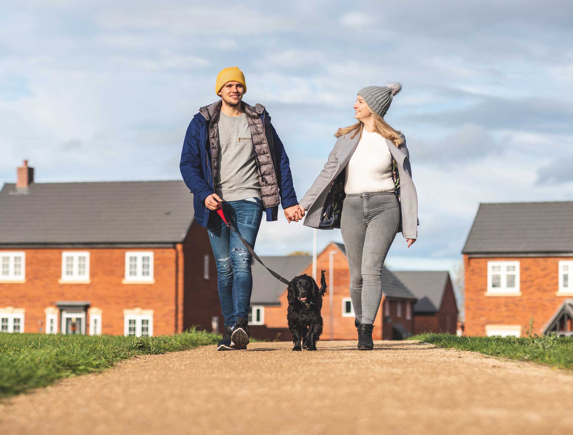 Couple walking the dog